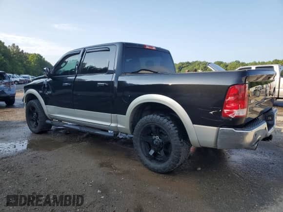 2009 Dodge 1500 SLT with VIN 1D3HV13T89S773730, listed as a Copart auction lot 68826695 with 150,777 mi miles and Salvage title. Bid and sale history available at DreamBid. Image 2.