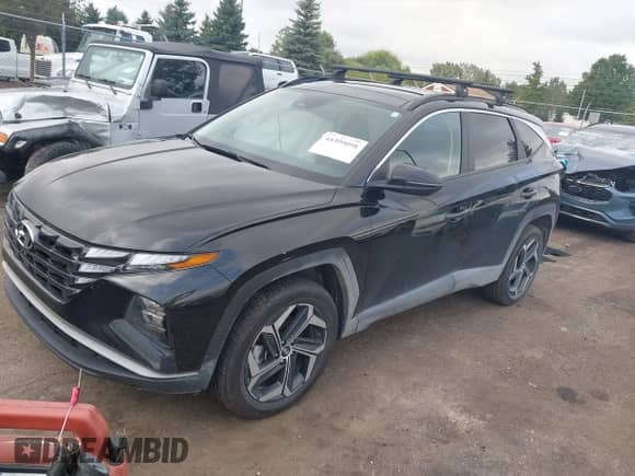 2022 Hyundai Tucson SEL Convenience with VIN KM8JFCA13NU061334, listed as a IAAI auction lot 43309098 with 75,772 mi miles and . Bid and sale history available at DreamBid. Image 2.