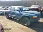 2003 Dodge Dakota Sport with VIN 1D7HG38X43S161466, listed as a Copart auction lot 46293235 with 237,061 mi miles and Salvage title. Bid and sale history available at DreamBid. Image 4.