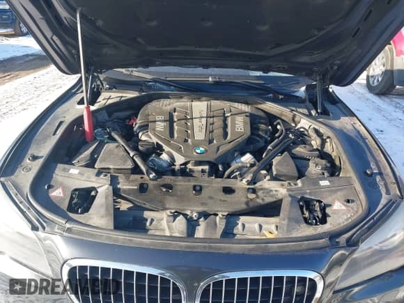 2012 BMW 7 Series 750Li xDrive with VIN WBAKC8C51CC437897, listed as a IAAI auction lot 41542970 with 133,864 mi miles and . Bid and sale history available at DreamBid. Image 10.