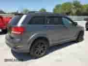 2014 Dodge Journey SXT with VIN 3C4PDCBB3ET155140, listed as a Copart auction lot 52374505 with 140,845 mi miles and Salvage title. Bid and sale history available at DreamBid. Image 3.