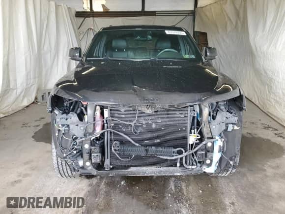 2015 Jeep Grand Cherokee Overland z VIN 1C4RJFCG8FC197684, wystawiony jako Copart lot #85574935 z przebiegiem Nie podano mil oraz Szkoda całkowita • Salvage title. Historia ofert i sprzedaży dostępna na DreamBid. Obrazek 5.