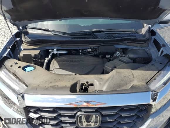 2024 Honda Passport EX-L with VIN 5FNYF8H5XRB018374, listed as a Copart auction lot 60676545 with 30,898 mi miles and Salvage title. Bid and sale history available at DreamBid. Image 12.