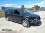 2013 Dodge Grand Caravan SXT with VIN 2C4RDGCG0DR502886, listed as a IAAI auction lot 43522518 with Not provided miles and . Bid and sale history available at DreamBid. Image 1.