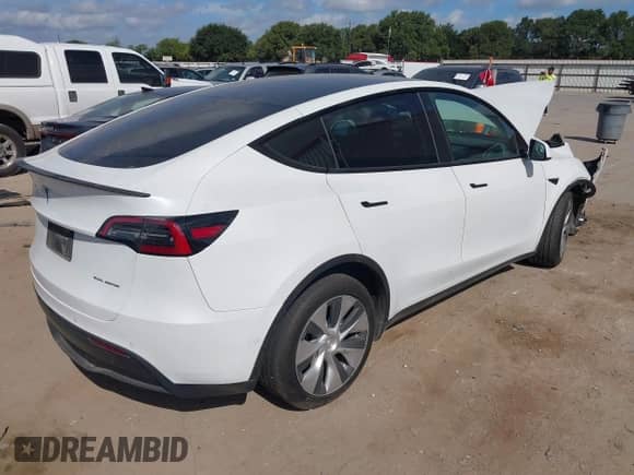 2022 Tesla Model Y Long Range z VIN 7SAYGDEEXNF353853, wystawiony jako IAAI lot #42792563 z przebiegiem 84 692 mil mil oraz . Historia ofert i sprzedaży dostępna na DreamBid. Obrazek 4.