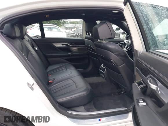 2017 BMW 7 Series 740e xDrive with VIN WBA7J2C30HG497919, listed as a IAAI auction lot 42717924 with 123,946 mi miles and . Bid and sale history available at DreamBid. Image 8.