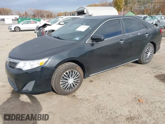 2014 Toyota Camry XLE with VIN 4T4BF1FK2ER354562, listed as a IAAI auction lot 43554838 with 197,062 mi miles and . Bid and sale history available at DreamBid. Image 2.