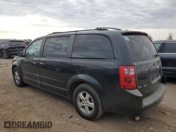 2010 Dodge Grand Caravan Hero z VIN 2D4RN3D14AR440343, wystawiony jako Copart lot #82374115 z przebiegiem 157 554 mil mil oraz Szkoda całkowita • Salvage title. Historia ofert i sprzedaży dostępna na DreamBid. Obrazek 2.