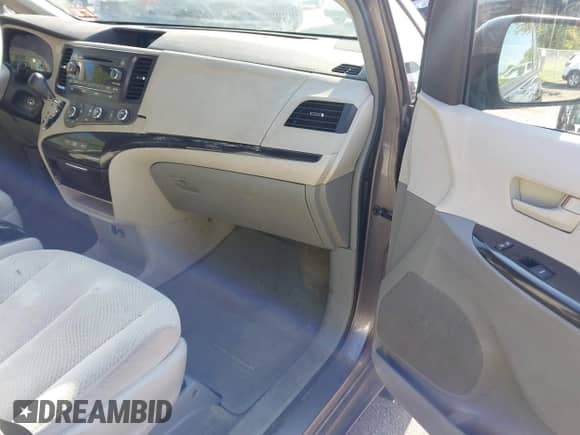 2012 Toyota Sienna LE AAS with VIN 5TDKK3DC9CS187233, listed as a IAAI auction lot 43269274 with 183,304 mi miles and . Bid and sale history available at DreamBid. Image 5.