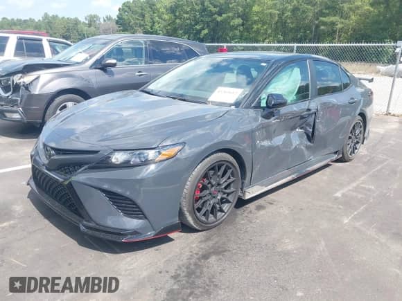 2024 Toyota Camry TRD with VIN 4T1KZ1AK6RU102635, listed as a IAAI auction lot 43265612 with 18,224 mi miles and . Bid and sale history available at DreamBid. Image 2.