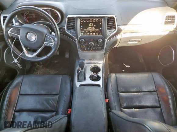 2016 Jeep Grand Cherokee High Altitude with VIN 1C4RJECGXGC422473, listed as a Copart auction lot 82463265 with 106,626 mi miles and Salvage title. Bid and sale history available at DreamBid. Image 8.