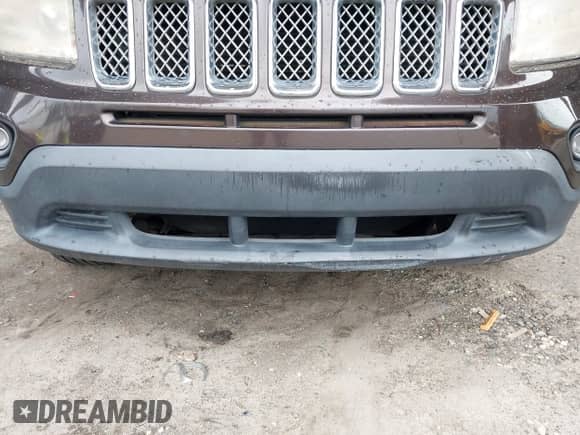 2014 Jeep Compass Latitude with VIN 1C4NJCEB5ED691041, listed as a IAAI auction lot 43112471 with 117,596 mi miles and . Bid and sale history available at DreamBid. Image 6.