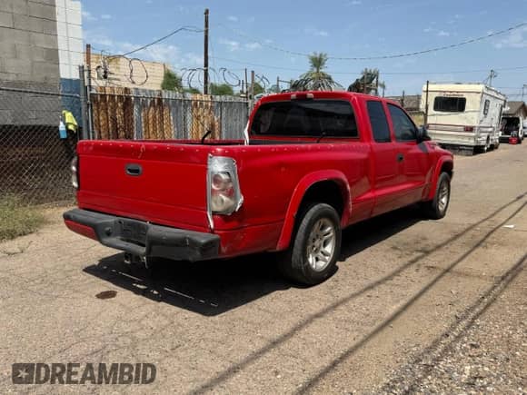 2001 Dodge Dakota с VIN 1B7GL22X61S151281, выставлен на аукционе Copart как лот 70411185 с пробегом 213 055 миль миль и Списание • Salvage title. История ставок и продаж доступна на DreamBid. Изображение 4.