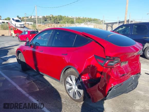 2021 Tesla Model Y Long Range with VIN 5YJYGDEE8MF203817, listed as a IAAI auction lot 43469412 with 41,471 mi miles and . Bid and sale history available at DreamBid. Image 3.