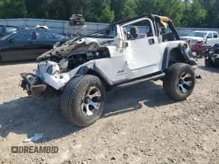 2005 Jeep Wrangler X with VIN 1J4FA39SX5P351763, listed as a Copart auction lot 69419165 with 160,832 mi miles and Non repairable. Bid and sale history available at DreamBid. Image 1.