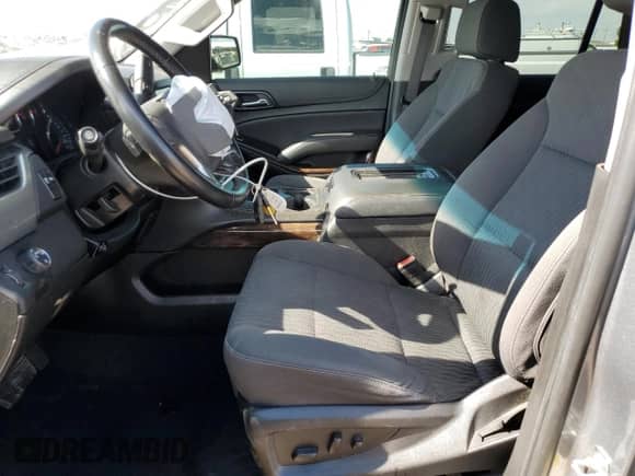 2019 Chevrolet Tahoe LS with VIN 1GNSCAKC8KR398173, listed as a Copart auction lot 64331585 with 52,519 mi miles and Salvage title. Bid and sale history available at DreamBid. Image 7.