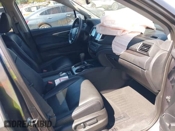 2018 Honda Pilot EX-L with VIN 5FNYF6H54JB063769, listed as a IAAI auction lot 43058335 with 95,054 mi miles and . Bid and sale history available at DreamBid. Image 5.