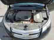 2015 Chevrolet Volt z VIN 1G1RD6E41FU138683, wystawiony jako Copart lot #81475155 z przebiegiem 129 075 mil mil oraz Czysty tytuł • Clean title. Historia ofert i sprzedaży dostępna na DreamBid. Obrazek 12.
