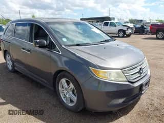 2011 Honda Odyssey Touring с VIN 5FNRL5H95BB024488, выставлен на аукционе IAAI как лот 43206534 с пробегом 237 000 миль миль и . История ставок и продаж доступна на DreamBid. Изображение 1.