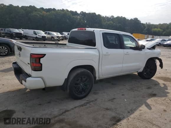 2023 Nissan Frontier Pro-X with VIN 1N6ED1EJ0PN607981, listed as a Copart auction lot 80810075 with 51,194 mi miles and Salvage title. Bid and sale history available at DreamBid. Image 3.
