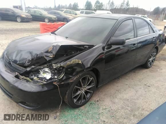 2003 Toyota Camry LE with VIN 4T1BE32K13U162612, listed as a IAAI auction lot 42839388 with 192,218 mi miles and . Bid and sale history available at DreamBid. Image 2.