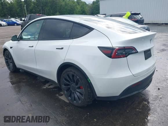 2022 Tesla Model Y Performance with VIN 7SAYGDEF7NF540878, listed as a IAAI auction lot 43102241 with 48,998 mi miles and . Bid and sale history available at DreamBid. Image 3.