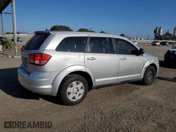 2012 Dodge Journey American Value с VIN 3C4PDCAB9CT204243, выставлен на аукционе Copart как лот 71920445 с пробегом 149 336 миль миль и Списание • Salvage title. История ставок и продаж доступна на DreamBid. Изображение 3.