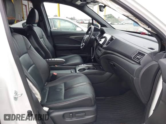 2022 Honda Pilot TrailSport with VIN 5FNYF6H8XNB082116, listed as a IAAI auction lot 42100968 with 31,697 mi miles and . Bid and sale history available at DreamBid. Image 5.