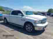 2014 Ram 1500 Laramie z VIN 1C6RR7VM1ES312946, wystawiony jako IAAI lot #42620415 z przebiegiem 163 405 mil mil oraz . Historia ofert i sprzedaży dostępna na DreamBid. Obrazek 1.