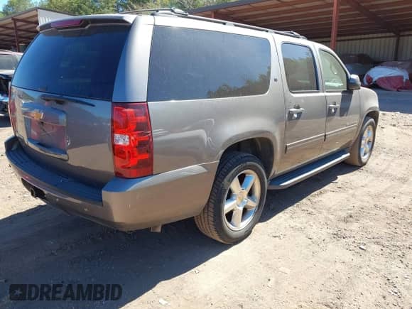 2012 Chevrolet Suburban LT z VIN 1GNSCJE05CR132810, wystawiony jako IAAI lot #43443683 z przebiegiem 189 351 mil mil oraz . Historia ofert i sprzedaży dostępna na DreamBid. Obrazek 4.