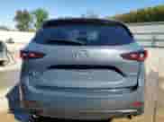 2025 Mazda CX-5 S Carbon Edition z VIN JM3KFBCM6S0679834, wystawiony jako Copart lot #87410845 z przebiegiem 13 497 mil mil oraz Czysty tytuł • Clean title. Historia ofert i sprzedaży dostępna na DreamBid. Obrazek 6.