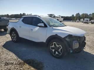 2022 Hyundai Santa Cruz Limited with VIN 5NTJEDAF6NH024833, listed as a Copart auction lot 77374634 with 26,684 mi miles and Salvage title. Bid and sale history available at DreamBid. Image 4.