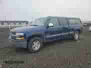 2002 Chevrolet Silverado 1500 LS z VIN 2GCEK19T621134585, wystawiony jako Copart lot #82629095 z przebiegiem 154 674 mil mil oraz Czysty tytuł • Clean title. Historia ofert i sprzedaży dostępna na DreamBid. Obrazek 1.
