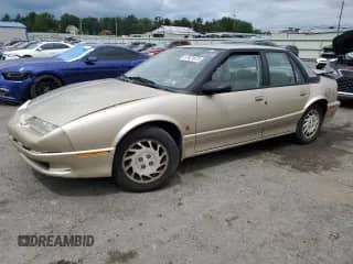 1994 Saturn SL with VIN 1G8ZK5578RZ228092, listed as a Copart auction lot 67421675 with 98,543 mi miles and Salvage title. Bid and sale history available at DreamBid. Image 1.