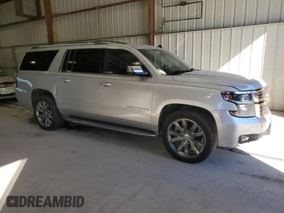 2015 Chevrolet Suburban LTZ with VIN 1GNSKKKC0FR230123, listed as a Copart auction lot 90385635 with 173,222 mi miles and Clean title. Bid and sale history available at DreamBid. Image 4.