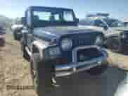 2005 Jeep Wrangler SE z VIN 1J4FA29S65P330905, wystawiony jako Copart lot #71633134 z przebiegiem 77 598 mil mil oraz Szkoda całkowita • Salvage title. Historia ofert i sprzedaży dostępna na DreamBid. Obrazek 5.