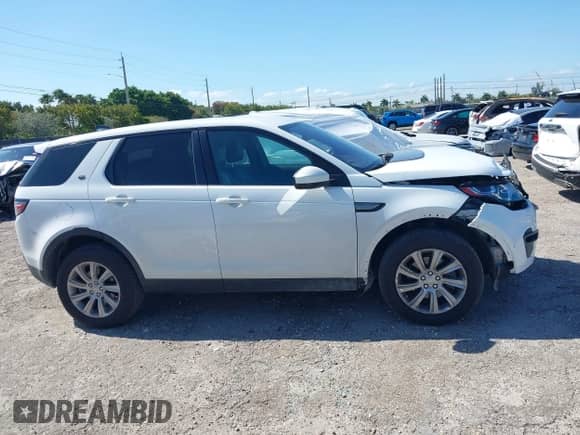 2018 Land Rover Discovery Sport SE with VIN SALCP2RX1JH740401, listed as a IAAI auction lot 42032873 with 77,111 mi miles and . Bid and sale history available at DreamBid. Image 14.