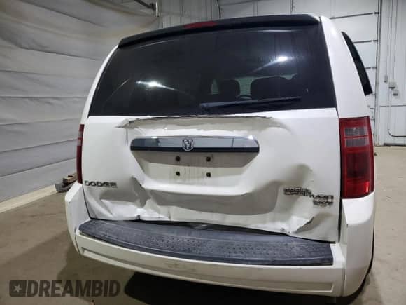 2010 Dodge Grand Caravan SXT z VIN 2D4RN5D17AR499253, wystawiony jako Copart lot #69954035 z przebiegiem 153 984 mil mil oraz Szkoda całkowita • Salvage title. Historia ofert i sprzedaży dostępna na DreamBid. Obrazek 6.