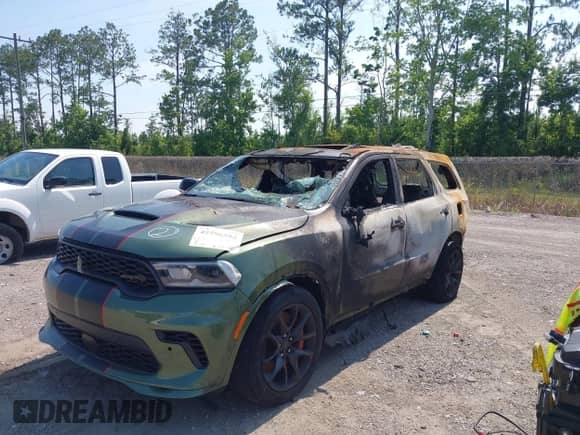 2021 Dodge Durango SRT Hellcat with VIN 1C4SDJH92MC683040, listed as a IAAI auction lot 42596594 with Not provided miles and . Bid and sale history available at DreamBid. Image 6.