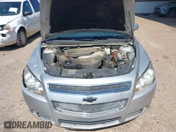 2012 Chevrolet Malibu LTZ z VIN 1G1ZG5E7XCF271129, wystawiony jako IAAI lot #42713063 z przebiegiem 127 511 mil mil oraz . Historia ofert i sprzedaży dostępna na DreamBid. Obrazek 10.