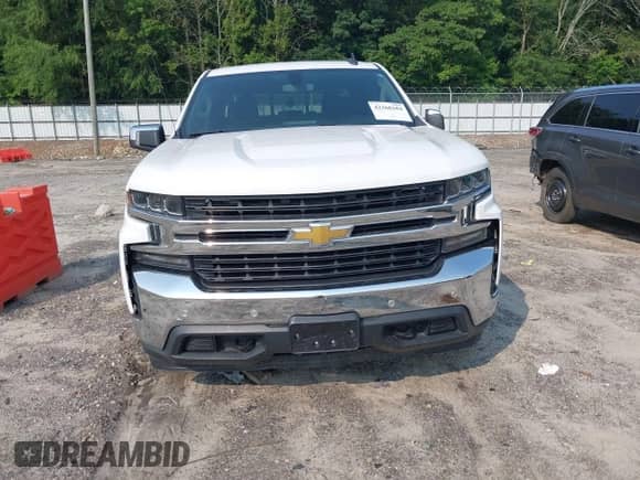 2021 Chevrolet Silverado 1500 LT with VIN 1GCPWCET1MZ183928, listed as a IAAI auction lot 42368184 with 99,138 mi miles and . Bid and sale history available at DreamBid. Image 12.