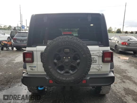 2023 Jeep Wrangler with VIN 1C4JJXN60PW663065, listed as a Copart auction lot 61904565 with 34,831 mi miles and Non repairable. Bid and sale history available at DreamBid. Image 6.