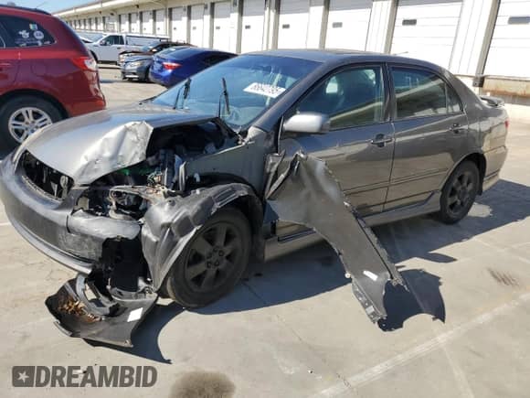 2008 Toyota Corolla CE z VIN 2T1BR32EX8C881154, wystawiony jako Copart lot #86642795 z przebiegiem 243 081 mil mil oraz Czysty tytuł • Clean title. Historia ofert i sprzedaży dostępna na DreamBid. Obrazek 1.