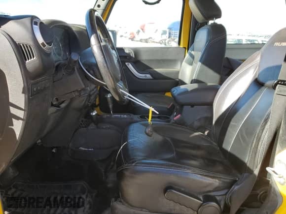 2015 Jeep Wrangler Rubicon z VIN 1C4BJWCG6FL568665, wystawiony jako Copart lot #85307974 z przebiegiem 107 407 mil mil oraz Szkoda całkowita • Salvage title. Historia ofert i sprzedaży dostępna na DreamBid. Obrazek 7.