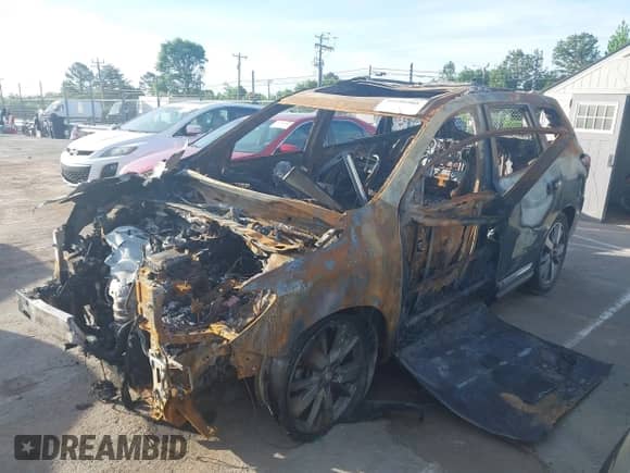 2014 Nissan Pathfinder Platinum Hybrid with VIN 5N1CR2MM4EC638247, listed as a IAAI auction lot 42067363 with Not provided miles and . Bid and sale history available at DreamBid. Image 2.