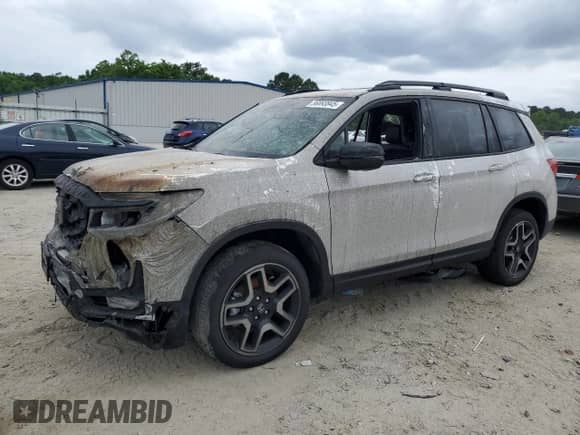 2023 Honda Passport Elite с VIN 5FNYF8H06PB022732, выставлен на аукционе Copart как лот 56893845 с пробегом 33 620 миль миль и Списание • Salvage title. История ставок и продаж доступна на DreamBid. Изображение 1.
