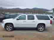 2014 Chevrolet Suburban LTZ with VIN 1GNSKKE77ER152002, listed as a IAAI auction lot 41930865 with 159,393 mi miles and . Bid and sale history available at DreamBid. Image 14.