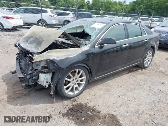 2009 Chevrolet Malibu LTZ with VIN 1G1ZK57799F231693, listed as a IAAI auction lot 42687084 with Not provided miles and . Bid and sale history available at DreamBid. Image 2.