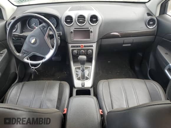 2014 Chevrolet Captiva Sport LT с VIN 3GNAL3EK9ES640609, выставлен на аукционе Copart как лот 74691734 с пробегом 150 482 миль миль и Списание • Salvage title. История ставок и продаж доступна на DreamBid. Изображение 8.