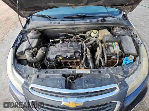 2015 Chevrolet Cruze LT z VIN 1G1PE5SB5F7234428, wystawiony jako Copart lot #86172445 z przebiegiem 124 539 mil mil oraz Czysty tytuł • Clean title. Historia ofert i sprzedaży dostępna na DreamBid. Obrazek 11.